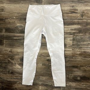 NWOT. Fabletics white leggings. Size medium.